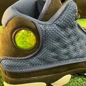 Air Jordan 13 in size 7Y. Preowned but in excellent condition.